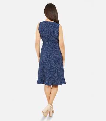 Click to view product details and reviews for Mela Blue Spot Frill Sleeveless Midi Wrap Dress New Look.