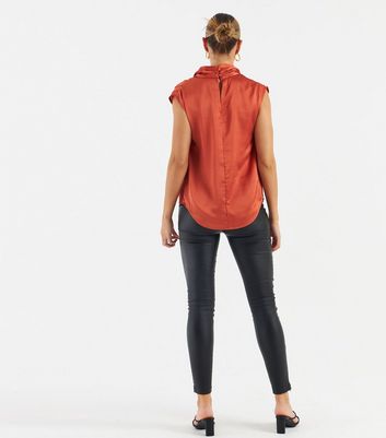 Click to view product details and reviews for Zibi London Coral Satin High Neck Blouse New Look.