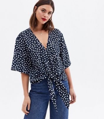 Click to view product details and reviews for Blue Vanilla Navy Spot Tie Batwing Blouse New Look.