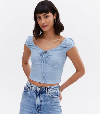 Click to view product details and reviews for Pale Blue Jersey Keyhole Tie Front Crop Top New Look.