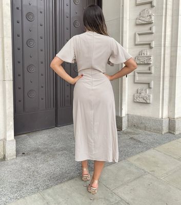 Click to view product details and reviews for Ax Paris Stone Ruched Midi Wrap Dress New Look.