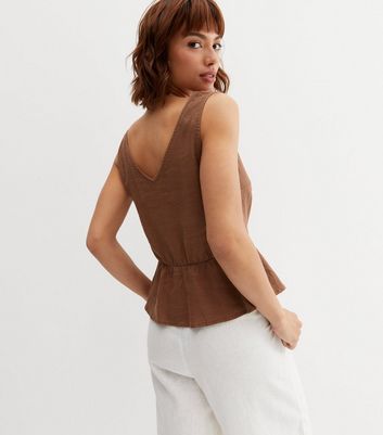 Peplum vest sales top