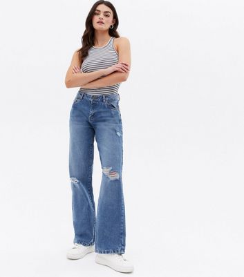 Click to view product details and reviews for Noisy May Pale Blue Ripped Wide Leg Jeans New Look.