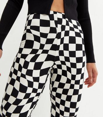 Click to view product details and reviews for Black Checkerboard Flared Trousers New Look.