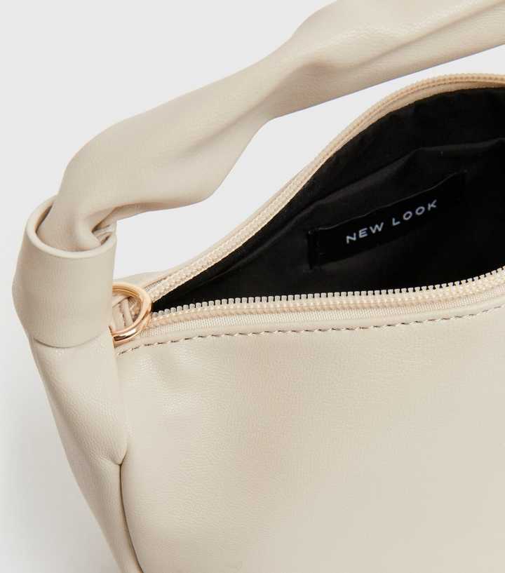 Worth the Tassel Crossbody Cream