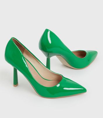 green patent pumps