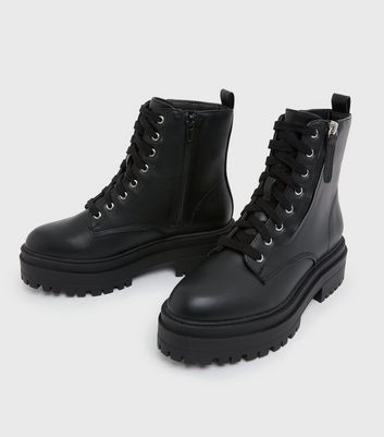 black flat lace up boots