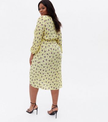 Click to view product details and reviews for Curves Yellow Ditsy Floral Plissé Belted Midi Wrap Dress New Look.