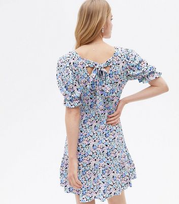 Click to view product details and reviews for Blue Floral V Neck Tiered Mini Dress New Look.