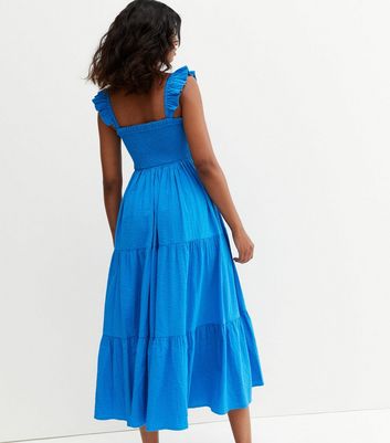 Click to view product details and reviews for Blue Shirred Square Neck Tiered Frill Midi Dress New Look.