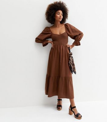 Click to view product details and reviews for Dark Brown Shirred Cut Out Side Tiered Midi Dress New Look.