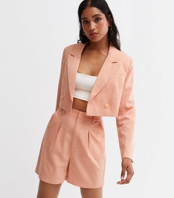 coral shorts suit