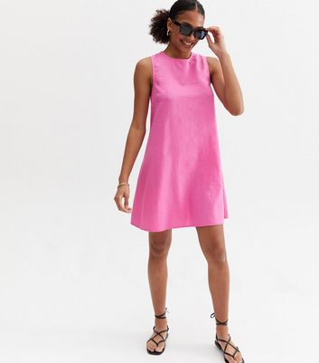 Click to view product details and reviews for Mid Pink Linen Blend Tie Back Mini Smock Dress New Look.