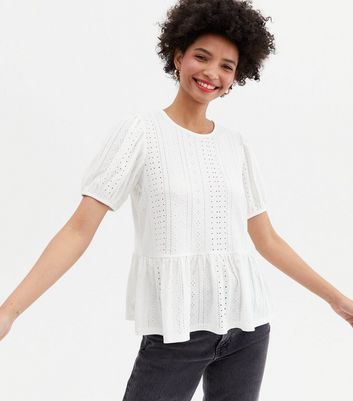 white broderie peplum top