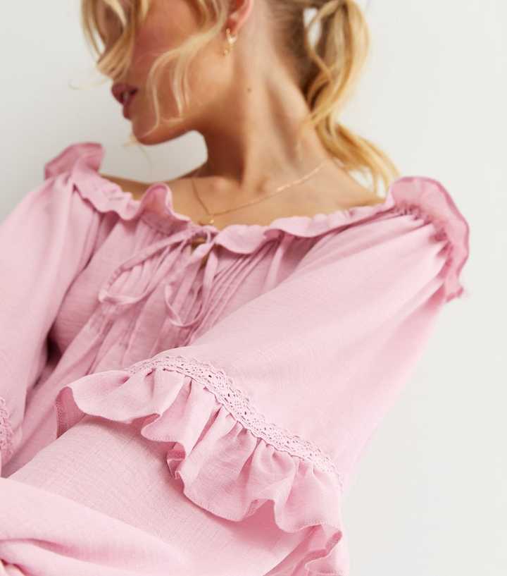 https://media2.newlookassets.com/i/newlook/828456870M2/womens/clothing/tops/pink-frill-puff-sleeve-bardot-top.jpg?strip=true&qlt=50&w=720