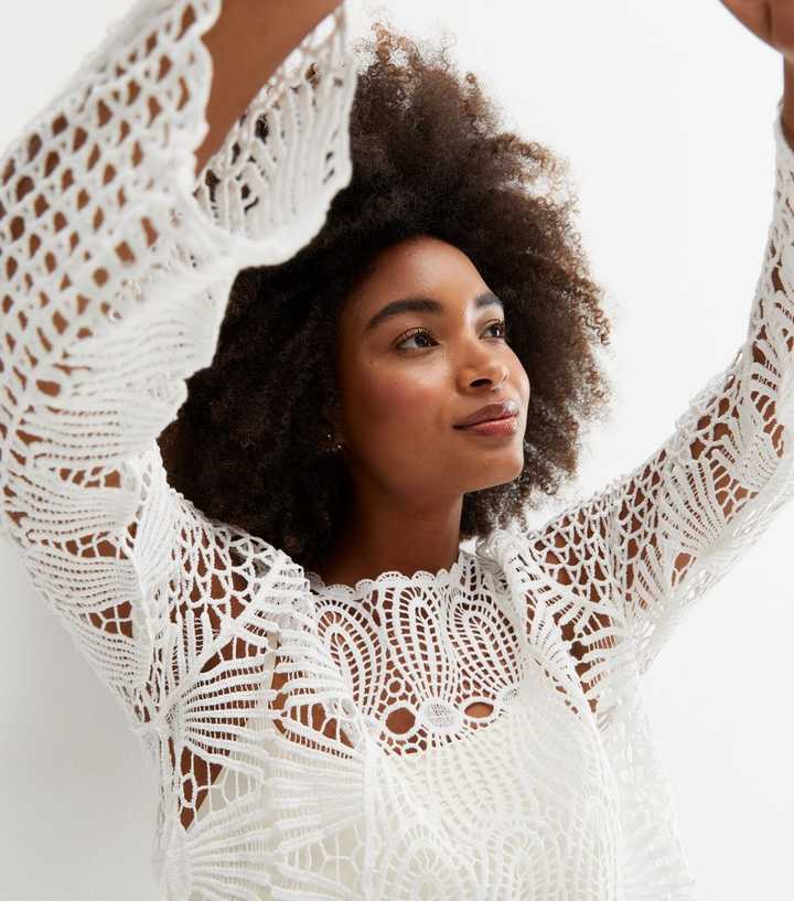 https://media2.newlookassets.com/i/newlook/829127810M1/womens/clothing/tops/white-crochet-long-sleeve-top.jpg?strip=true&qlt=50&w=720