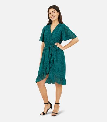 Click to view product details and reviews for Mela Green Spot Frill Wrap Dress New Look.