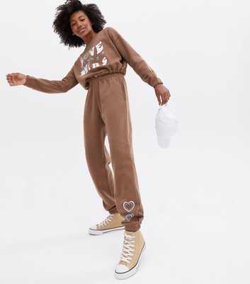 Brown Jersey Logo Love Wins Cuffed Joggers