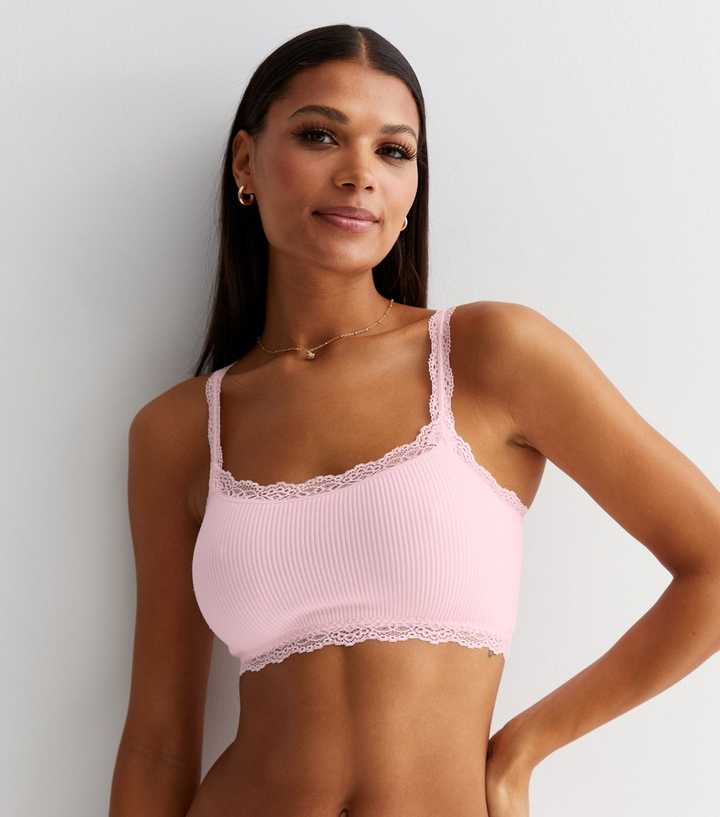 https://media2.newlookassets.com/i/newlook/830203973/womens/clothing/lingerie/mid-pink-lace-trim-seamless-crop-top-bra.jpg?strip=true&qlt=50&w=720