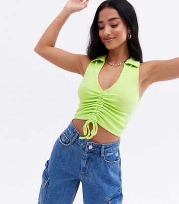 Click to view product details and reviews for Petite Green Ruched Front Collared Crop Top New Look.