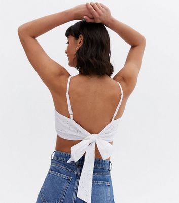 Click to view product details and reviews for Pink Vanilla White Broderie Tie Back Crop Top New Look.