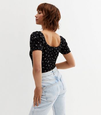 Click to view product details and reviews for Black Ditsy Floral Ribbed Puff Sleeve Bodysuit New Look.