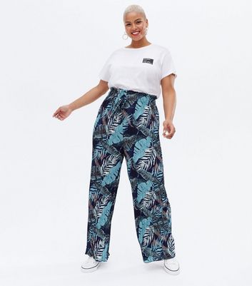 Click to view product details and reviews for Blue Vanilla Curves Blue Tropical Pliss&eacute; Wide Leg Trousers New Look.