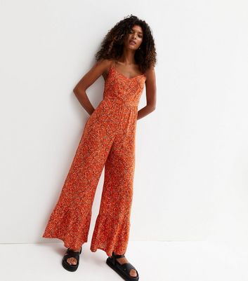 Floral strappy sales jumpsuit