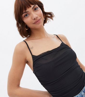 Click to view product details and reviews for Black Mesh Ruched Strappy Bodysuit New Look.