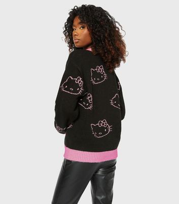 Click to view product details and reviews for Skinnydip Black Hello Kitty Knit Jumper New Look.