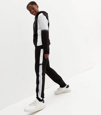 black joggers with white side stripe