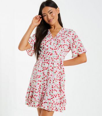 Click to view product details and reviews for Quiz Pink Ditsy Floral Wrap Skater Dress New Look.