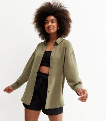 Click to view product details and reviews for Khaki Oversized Shirt New Look.