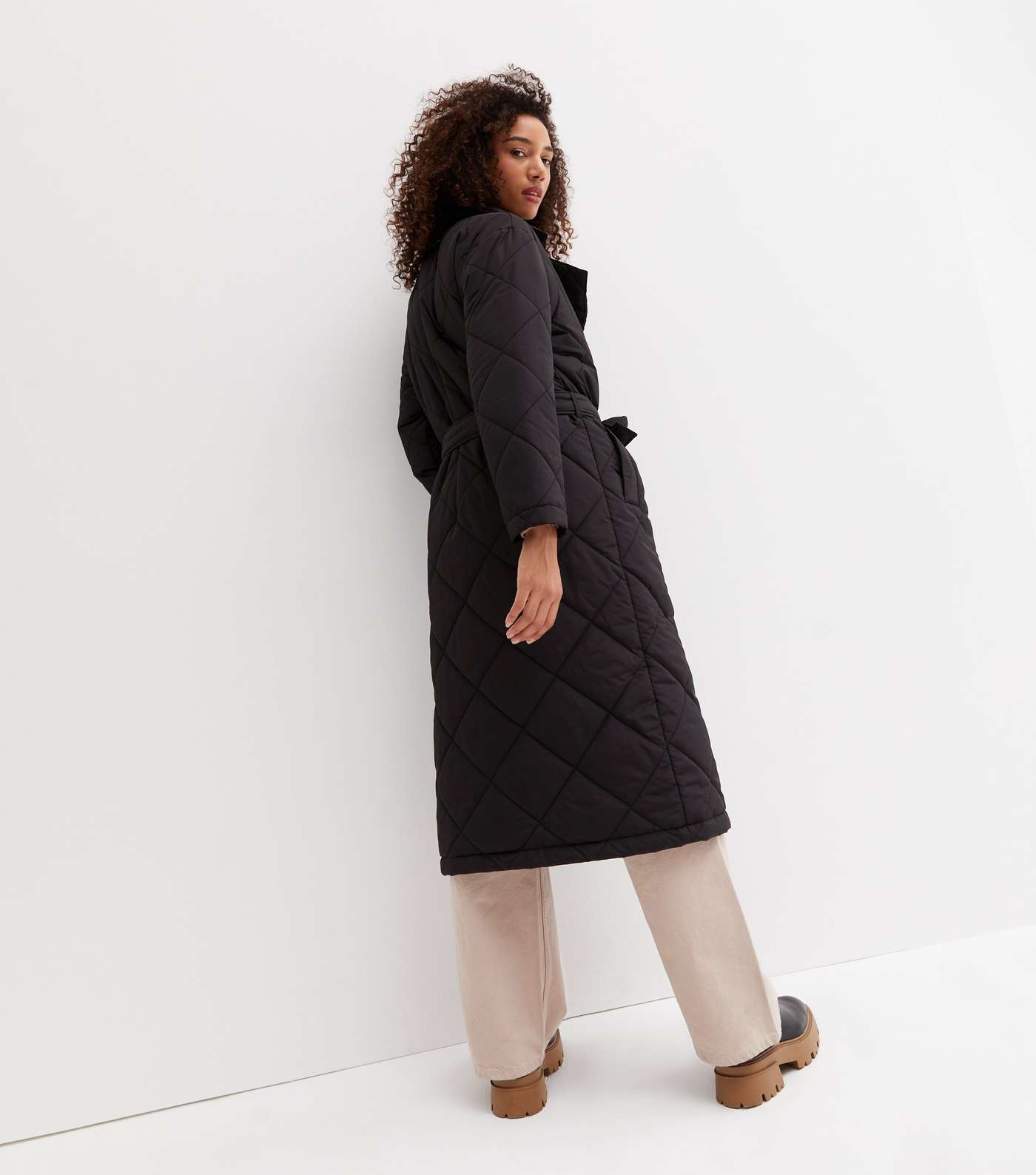 Black Quilted Revere Collar Belted Long Puffer Jacket Image 4