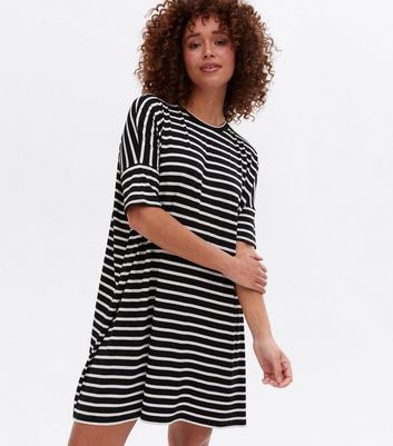 Click to view product details and reviews for Black Stripe Jersey Oversized T Shirt Dress New Look.