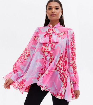 Click to view product details and reviews for Pink Leopard Print Tie High Neck Long Blouse New Look.