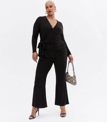 Click to view product details and reviews for Curves Black Flared Trousers New Look.