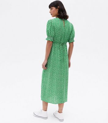 Click to view product details and reviews for Green Ditsy Floral Puff Sleeve Midi Dress New Look.