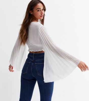 Click to view product details and reviews for Cameo Rose Off White Pleated Sleeve Crop Wrap Top New Look.