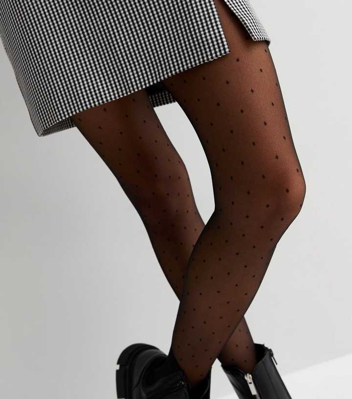 https://media2.newlookassets.com/i/newlook/835276901M2/womens/accessories/hosiery/black-polka-dot-fashion-tights.jpg?strip=true&qlt=50&w=720