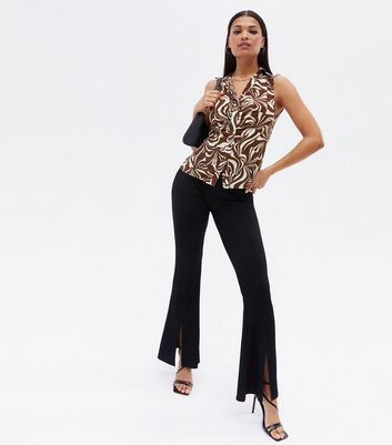 Click to view product details and reviews for Brown Swirl Jersey Ruched Collared Top New Look.