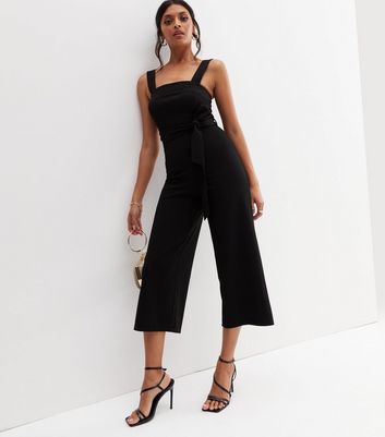 black sleeveless wide leg jumpsuit