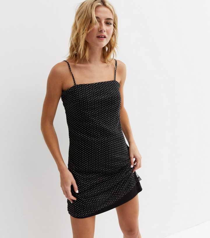 https://media2.newlookassets.com/i/newlook/836321809/womens/clothing/dresses/black-spot-mesh-strappy-mini-dress.jpg?strip=true&qlt=50&w=720