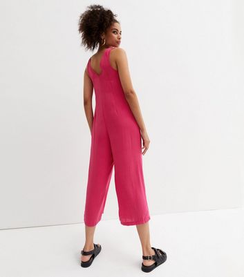 pink button up jumpsuit