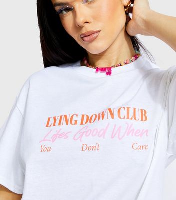 Click to view product details and reviews for Skinnydip White Lying Down Club Oversized Logo T Shirt New Look.