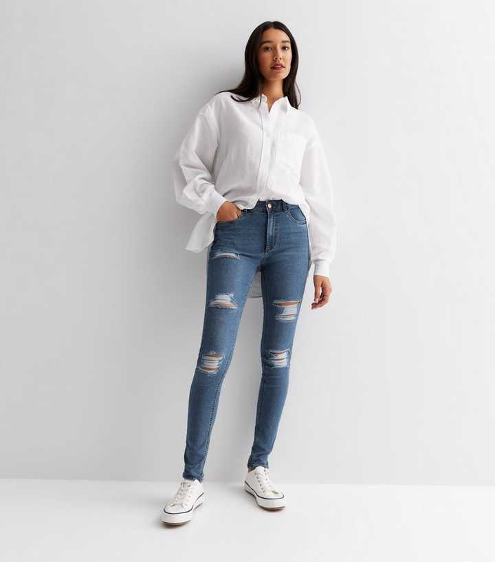 https://media2.newlookassets.com/i/newlook/839731940/womens/clothing/jeans/tall-blue-extreme-ripped-high-waist-hallie-super-skinny-jeans.jpg?strip=true&qlt=50&w=720