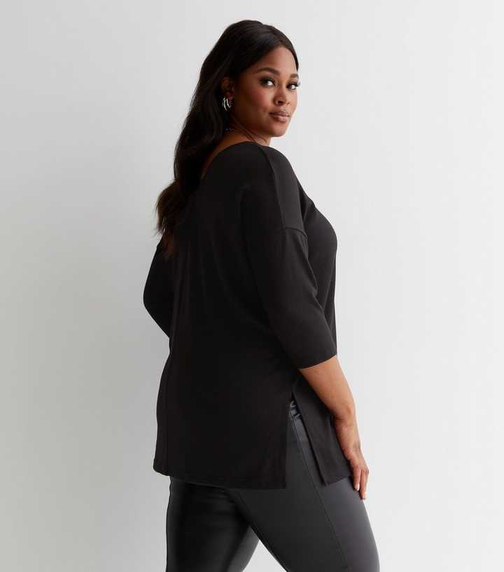 https://media2.newlookassets.com/i/newlook/839956001M3/womens/clothing/knitwear/curves-black-fine-knit-long-v-neck-top.jpg?strip=true&qlt=50&w=720