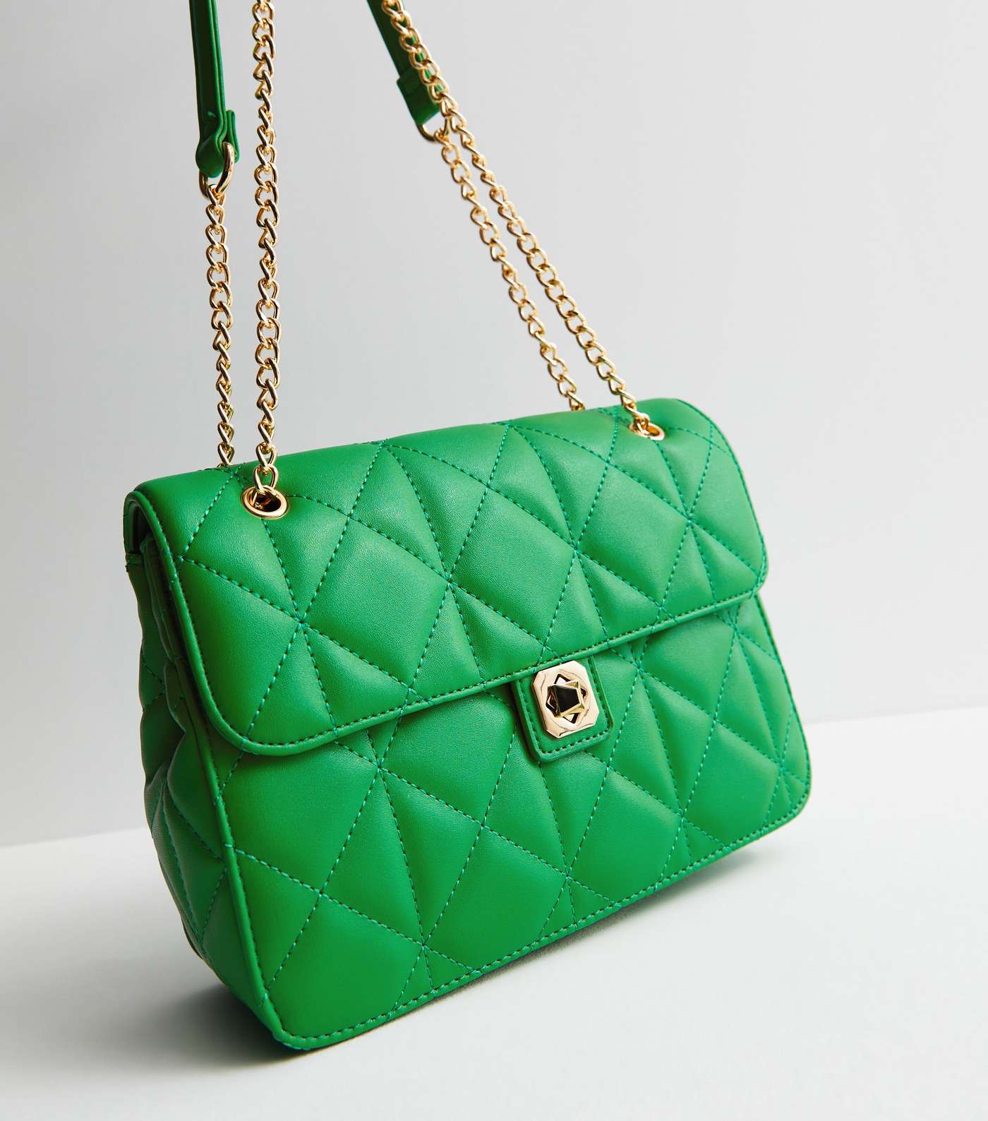 Green Quilted Twist Lock Cross Body Bag