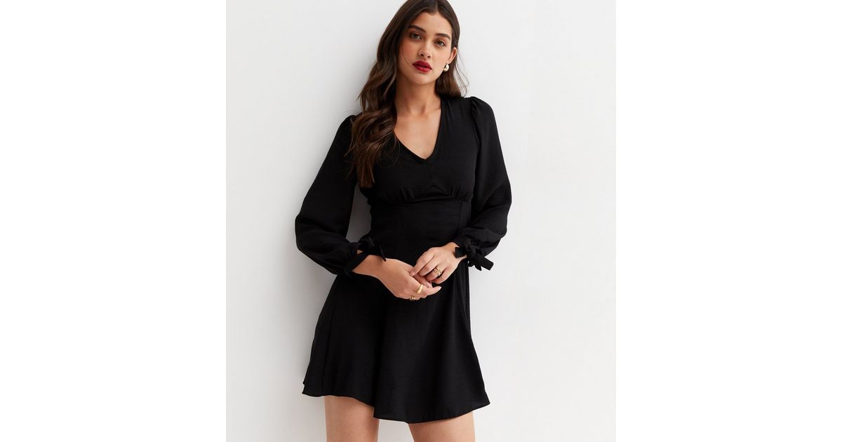 Printed Tie Neck Long Sleeve Mini Dress main image 0