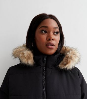 Womens Clothing Coats Fur coats DKNY Hooded Faux Fur Coat in Black 